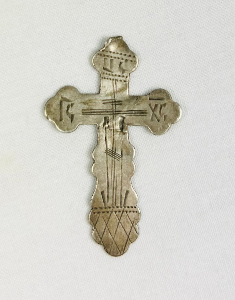 Russian Orthodox engraved silver cross, late 19th century, 84 zolotnik (.875) silver, IC XC inscriptions, Golgotha base, scalloped trefoil terminals, 1.5 x 1 inches
