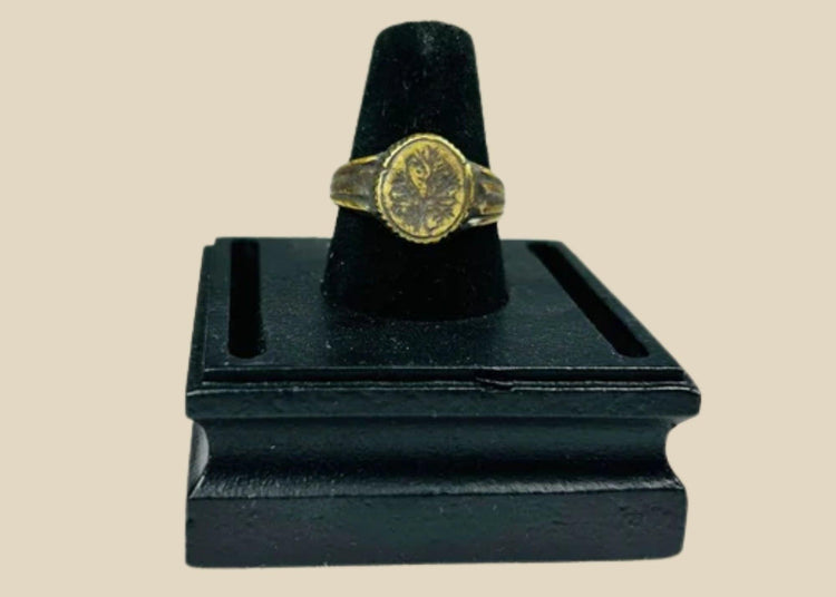 Late Roman to Early Byzantine gold-gilded bronze ring, circa 300–600 CE, with engraved floral bezel, worn gilding, and authentic patina.