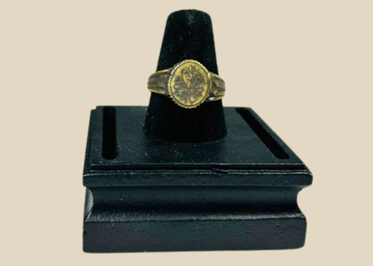 Late Roman to Early Byzantine gold-gilded bronze ring, circa 300–600 CE, with engraved floral bezel, worn gilding, and authentic patina.
