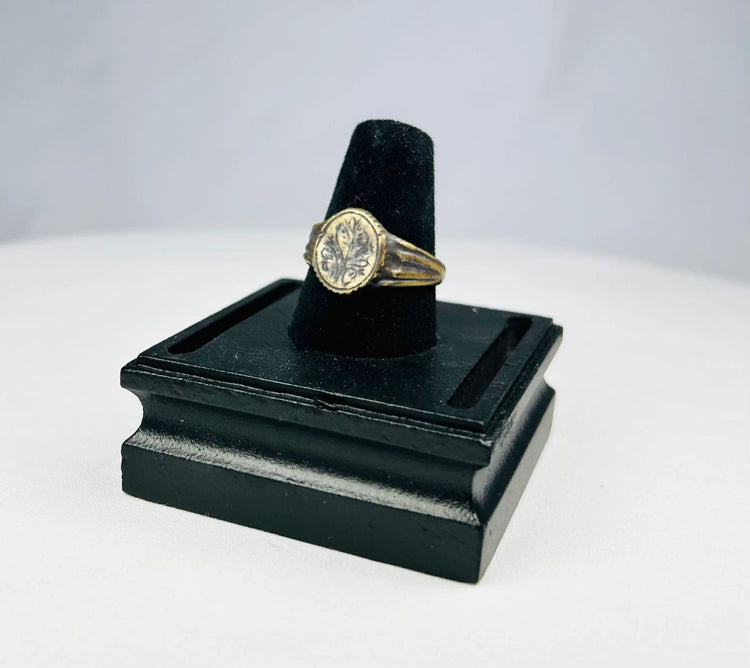 Late Roman to Early Byzantine gold-gilded bronze ring, circa 300–600 CE, with engraved floral bezel, worn gilding, and authentic patina.