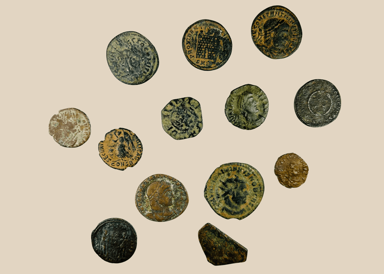 Ancient Roman coin obverse showing emperor portrait with aged patina