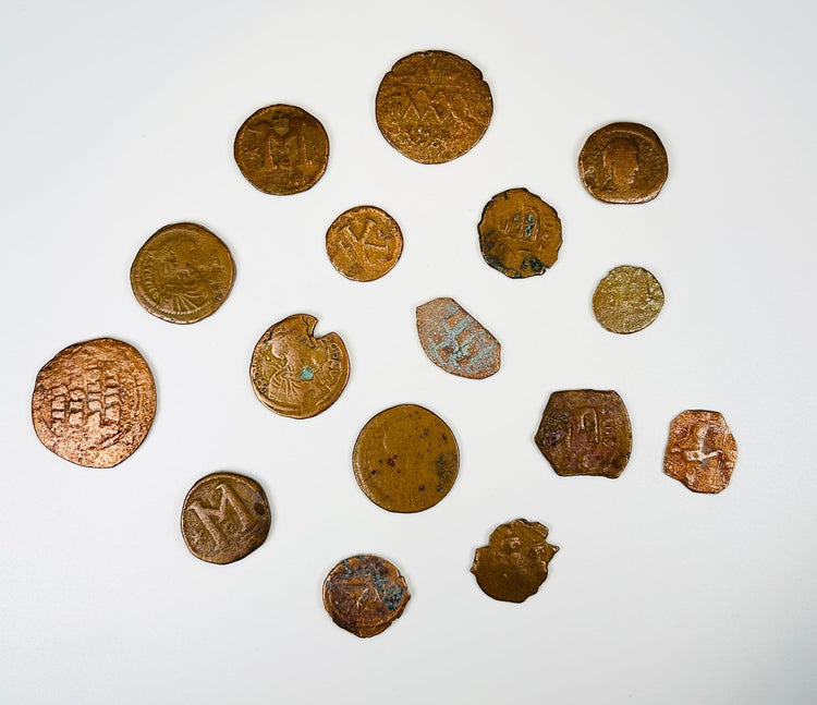 Group of excavated Roman Byzantine coins with green and brown burial patina