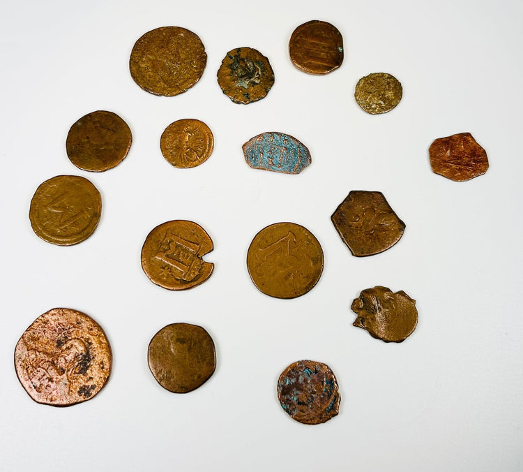 Assorted Roman Byzantine bronze coins with mineral encrustation and historic wear