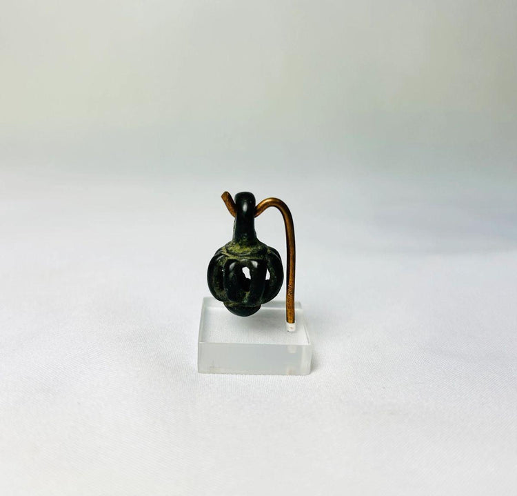 Historical Luristan pendant bell protective and symbolic Iron Age artifact