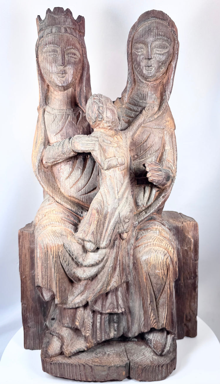 Medieval-inspired carved wooden ecclesiastical sculpture with crowned Virgin Mary and Saint Anne