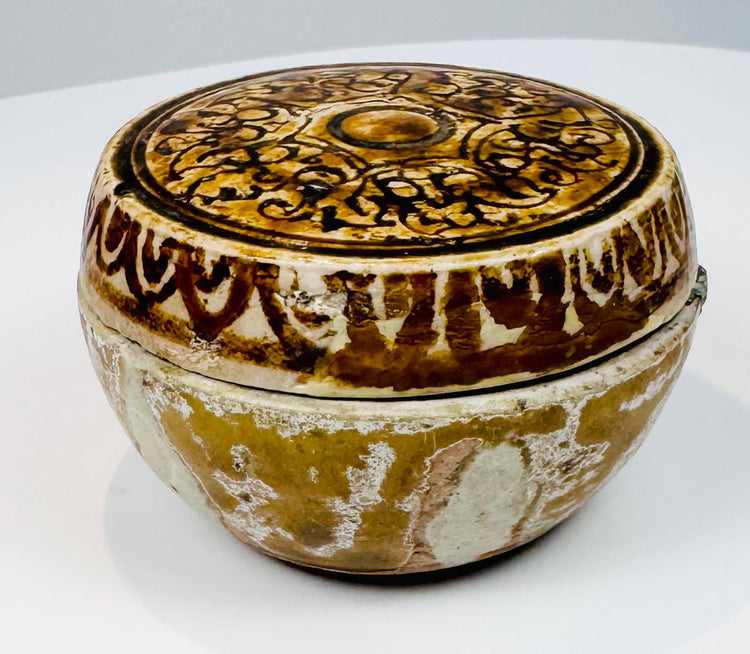 Three-quarter view of the iron-brown decorated Thai covered ceramic box