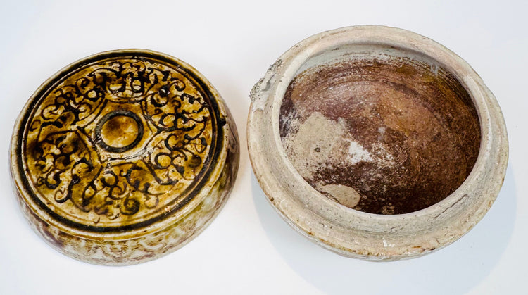 Interior view of the Thai covered box showing its brownish glaze and unglazed rim