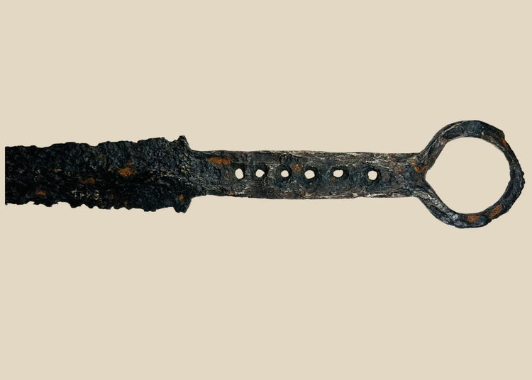 14th-century medieval European quillon dagger with tapered blade, crossguard, and ring pommel, forged steel and iron construction with aged patina.