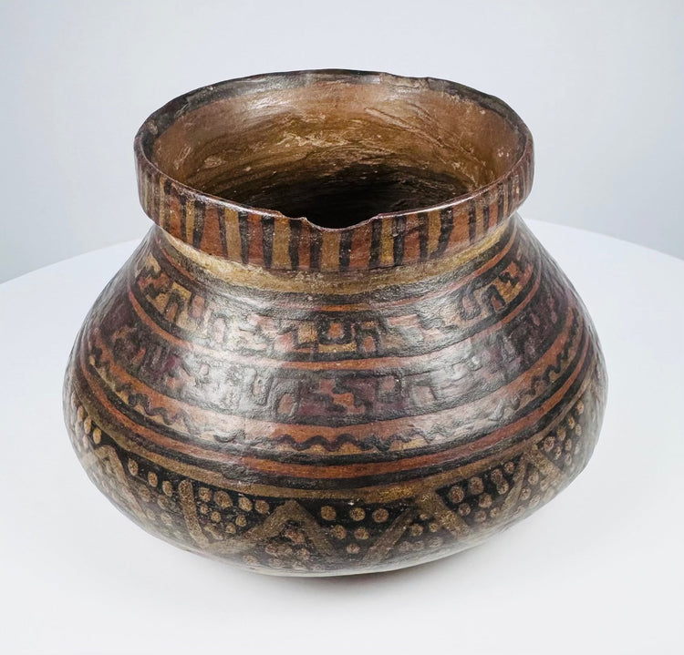 Mesoamerican polychrome redware pottery bowl with geometric painted decoration, circa 1st millennium CE