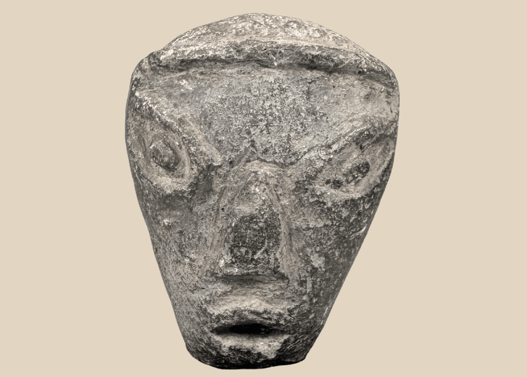 Ancient Mesopotamian pottery head of a stylized youthful figure, circa 2000–1500 BCE