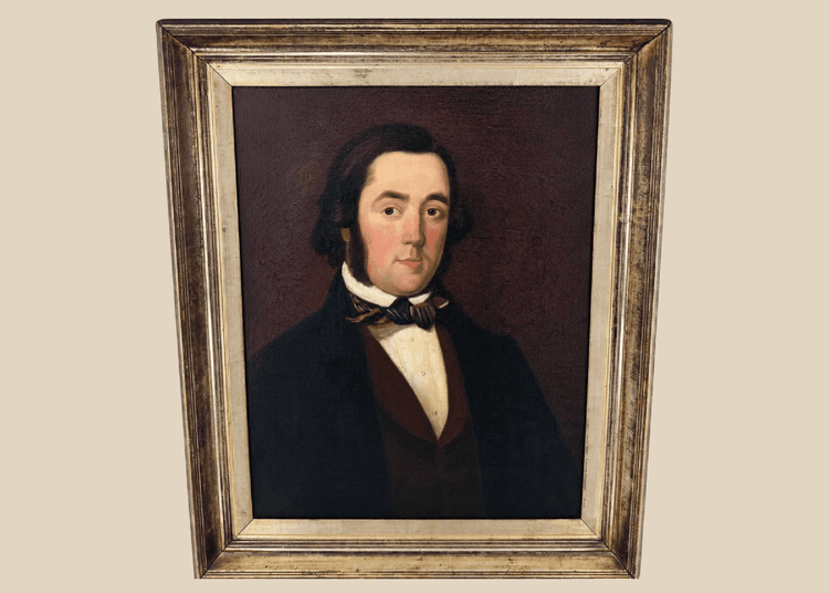 Early Victorian British oil portrait of a gentleman in a dark frock coat and patterned cravat