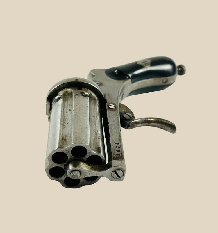 Mid-19th century Meyers Pepperbox Pinfire Revolver, double-action multi-barrel design with folding trigger, left-side loading gate, wood grip panels, marked with Belgian Liège proof stamps, compact 4.5-inch antique firearm, circa 1860, collectible historical weapon