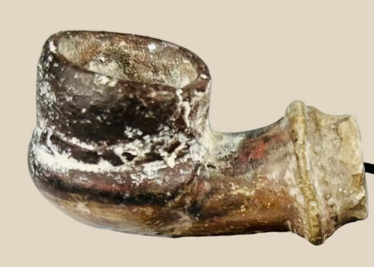 18th–19th century Middle Eastern or North African earthenware spout fragment, hand-formed with rounded bowl and narrow projecting stem, mineral encrustations, archaeological pottery piece