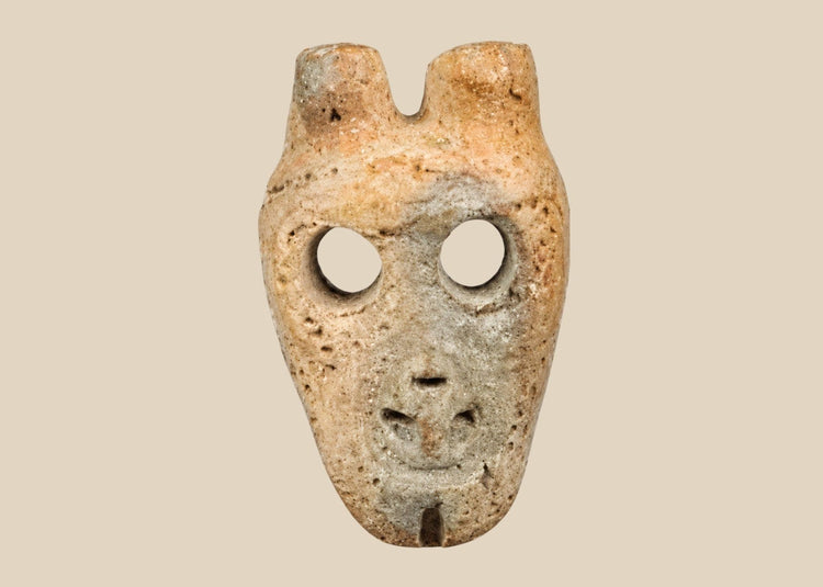 West Mexico ancient bone anthropomorphic mask pendant with hollowed eyes and incised features