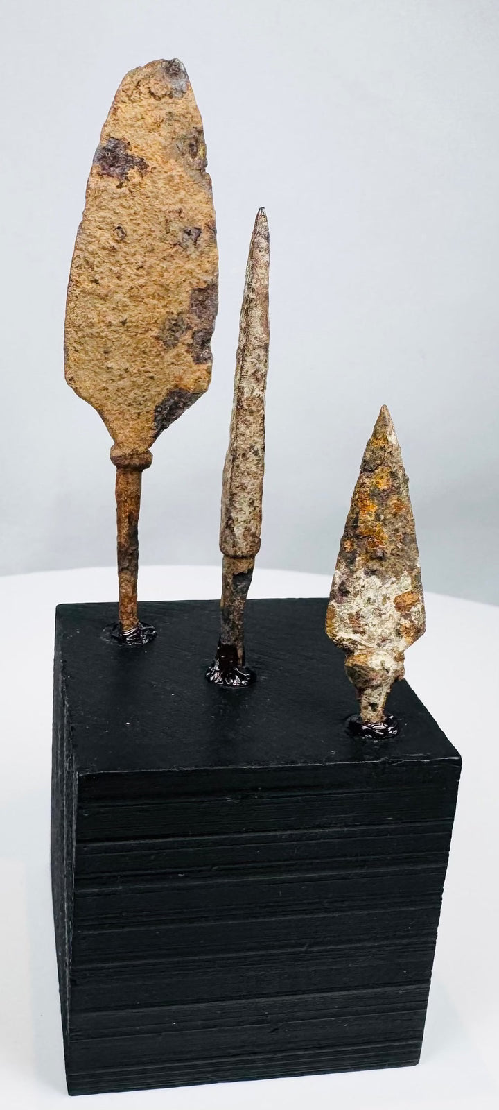 Long narrow bodkin-style medieval projectile point with heavily oxidized surface
