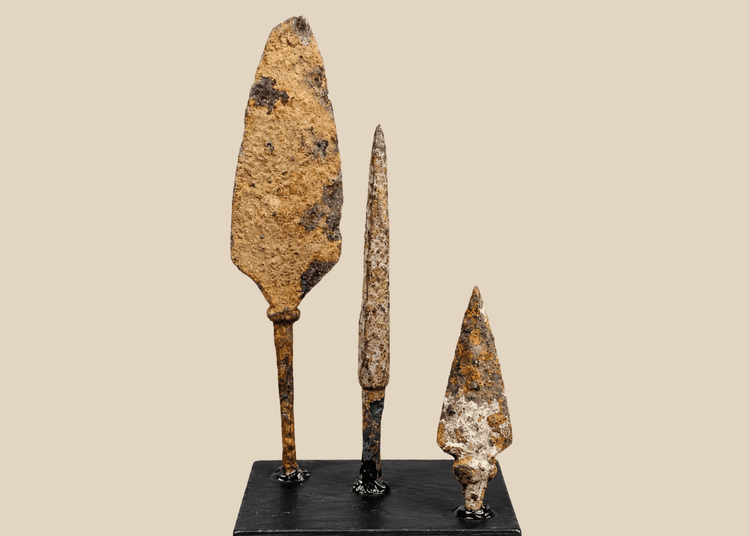 Group of three ancient Roman to medieval iron projectile points on black display bases