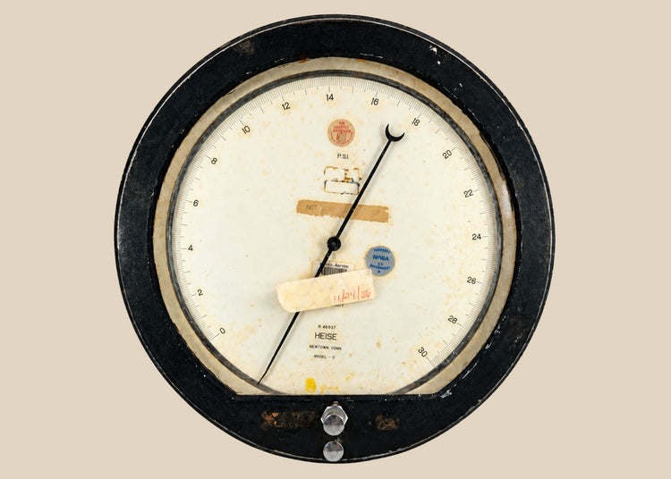 Authentic NASA low-pressure gauge from the Space Shuttle Program, mid-1980s. Manufactured by Heise in Newtown, Connecticut, marked “Property of NASA U.S. Government,” with original calibration and service stickers. Ground support equipment used for monitoring hydraulic, fuel, or environmental pressures during shuttle pre-launch operations.