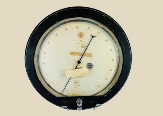Authentic NASA low-pressure gauge from the Space Shuttle Program, mid-1980s. Manufactured by Heise in Newtown, Connecticut, marked “Property of NASA U.S. Government,” with original calibration and service stickers. Ground support equipment used for monitoring hydraulic, fuel, or environmental pressures during shuttle pre-launch operations.