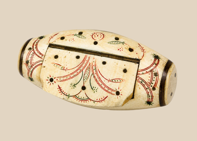 Antique Napoleonic prisoner-of-war snuff box, carved bone with red and green ink floral designs, domed lid, circa 1793–1815.