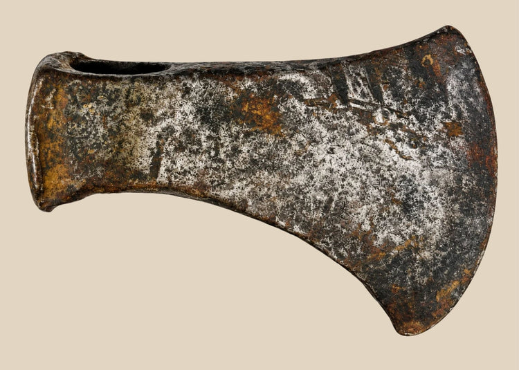 Antique 19th-century North American axe head, hand-forged iron with weathered patina and signs of historic use.