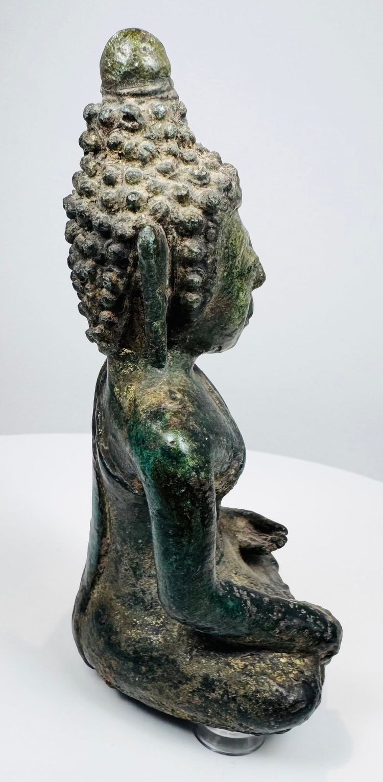 Opposite profile of the seated Lan Na Buddha showing its compact proportions