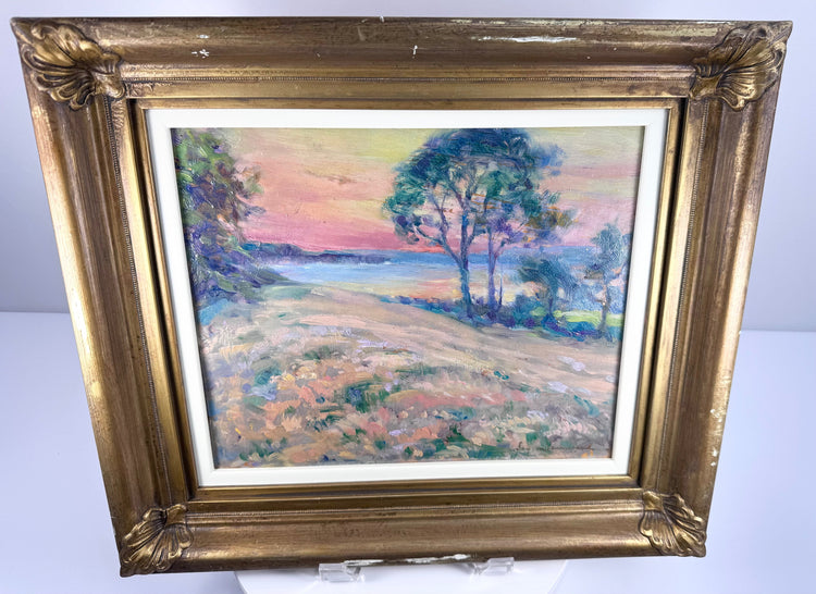 Ornate gold-toned frame surrounding an impressionistic Bay of Fundy landscape.