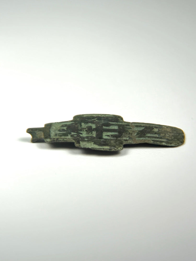 Early 19th century Russian Orthodox wearable cross with worn top suspension lug, dark patina, and traces of original enamel.