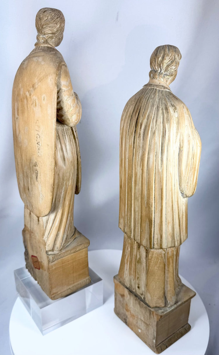 European ecclesiastical carvings with detailed craftsmanship, aged patina, and sculptural presence.