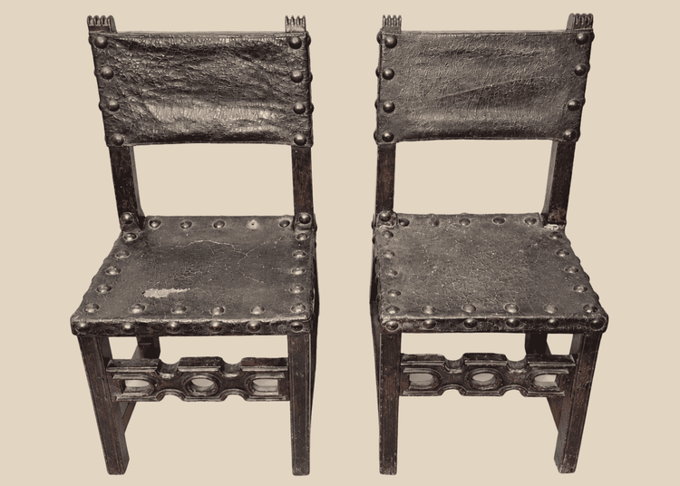 Pair of 17th-century Spanish Baroque walnut side chairs with leather upholstery
