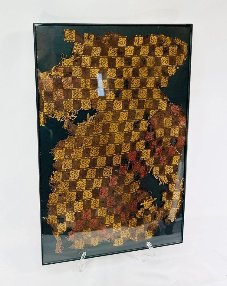 Ancient Chancay textile fragment with natural-dyed checkerboard cotton weaving from coastal Peru.