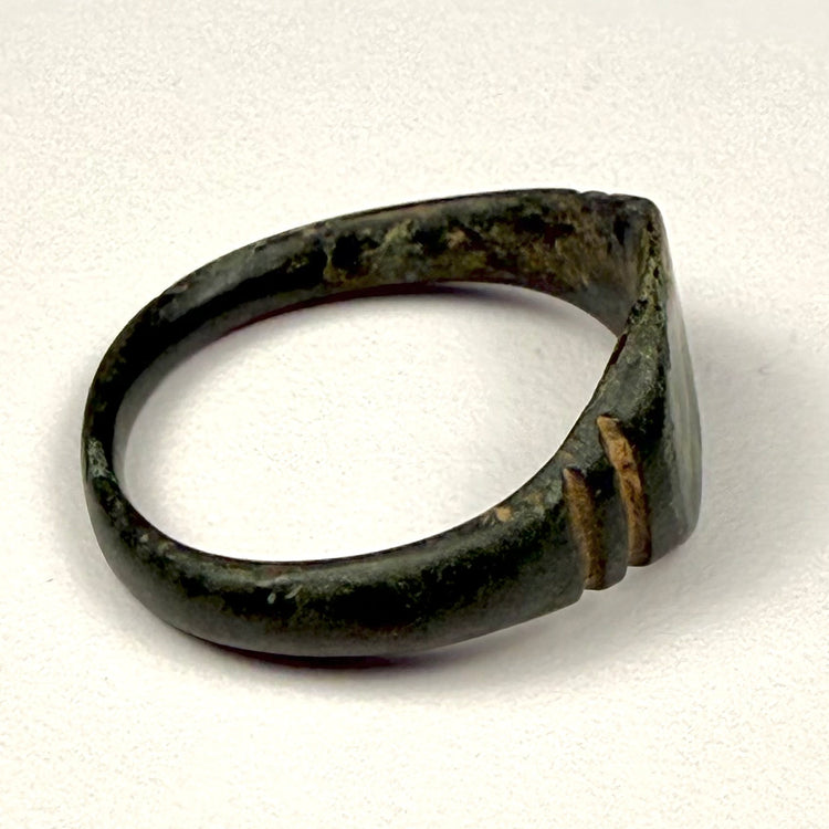 US size 9 ancient Roman bronze ring with complete hoop, wide bezel, and naturally developed green patina