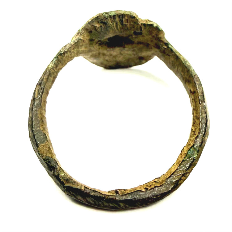 Close-up of Early Byzantine bronze finger ring with starburst-like geometric bezel decoration