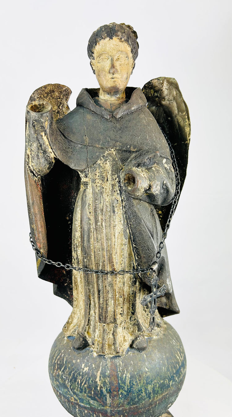 Antique Colonial Latin American polychrome wooden angel with gilded wings and orb base