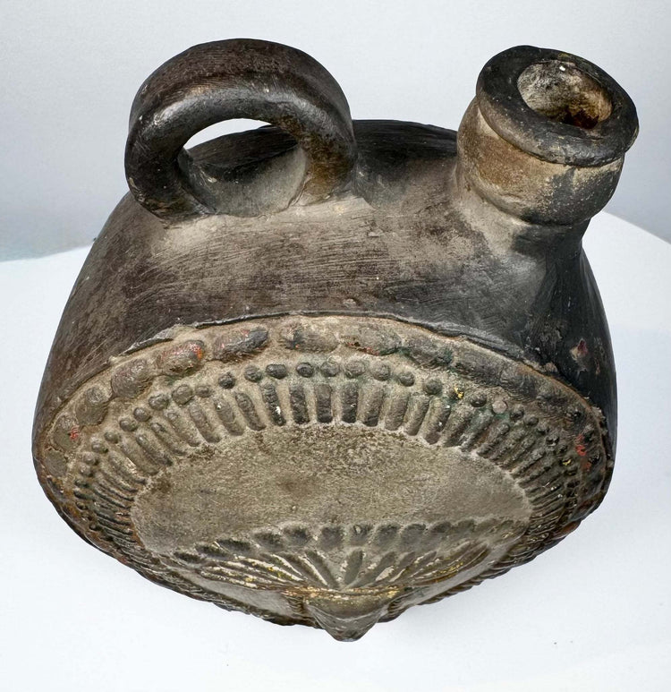 Pre-Columbian ceramic canteen with loop handle and short pouring spout