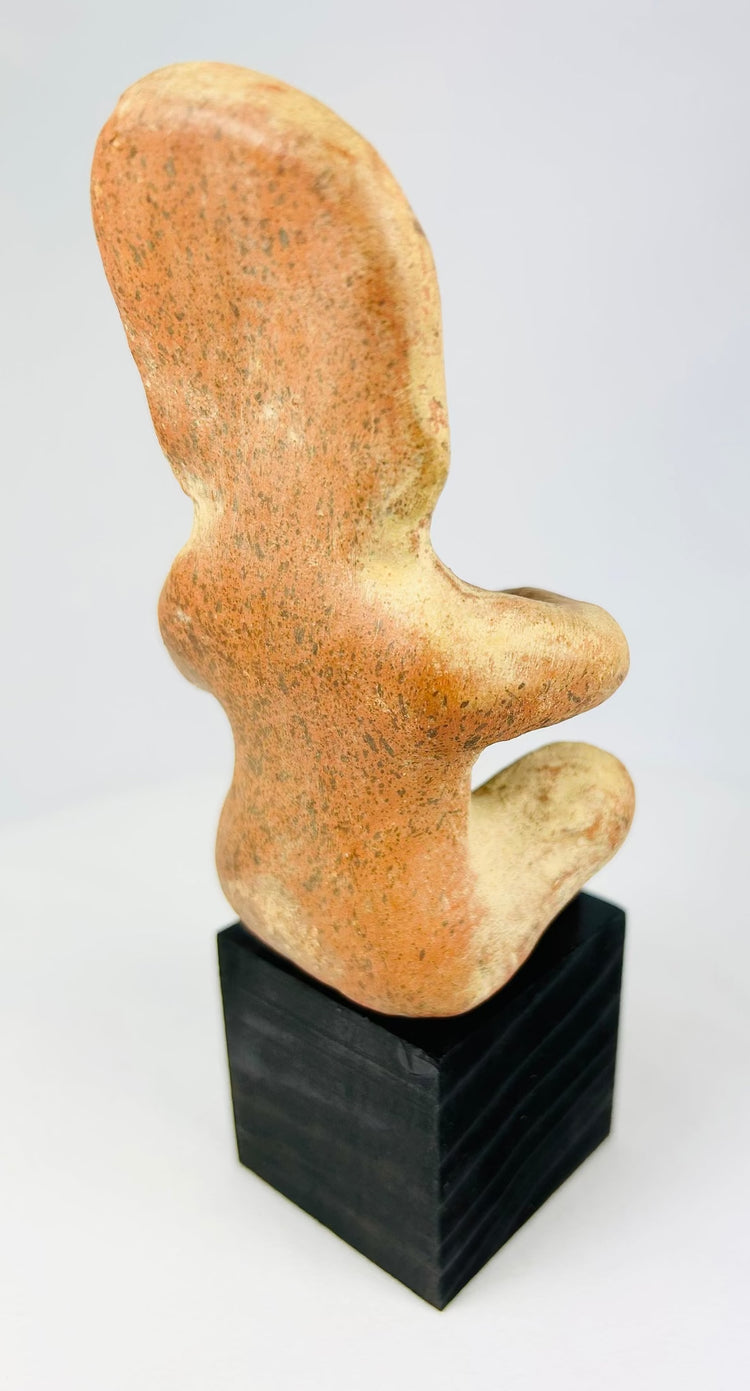 Pre-Columbian Nayarit/Jalisco terracotta sculpture, seated anthropomorphic figure, funerary artifact on stand