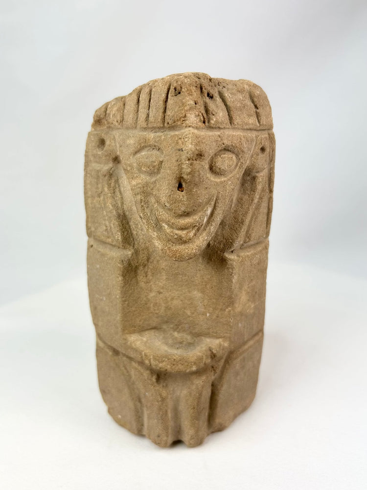 Pre-Columbian carved stone idol with stylized human features, volcanic stone, circa 500–1000 CE