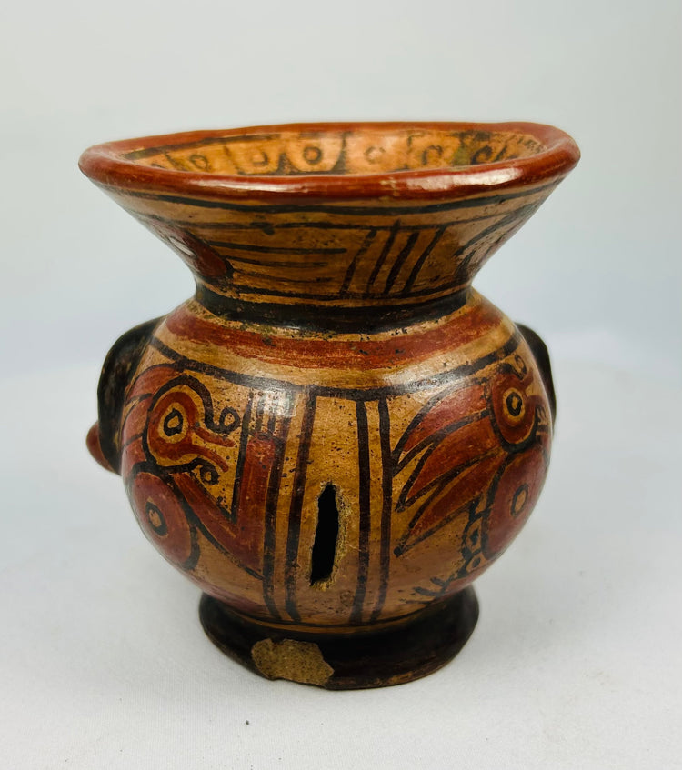 Rear view of Pre-Columbian effigy bowl highlighting cream slip and hand-burnished surface