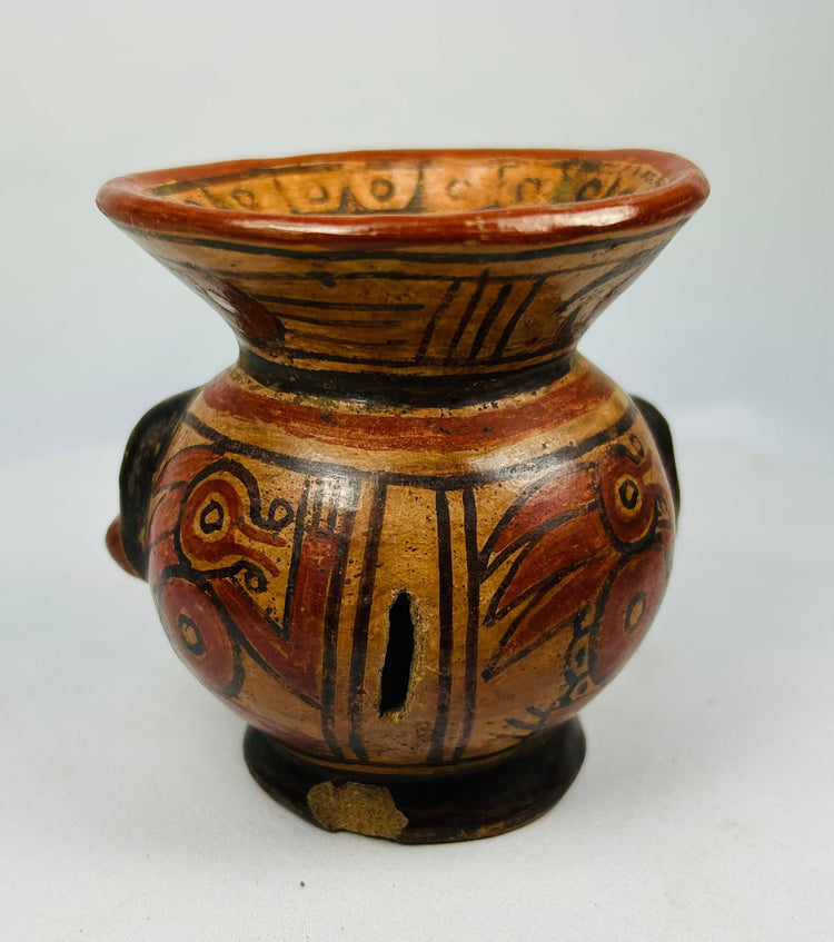 Rear view of Pre-Columbian effigy bowl highlighting cream slip and hand-burnished surface