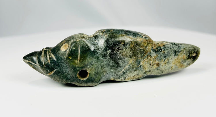 Ancient Pre-Columbian pendant carved from greenstone with symbolic animal form