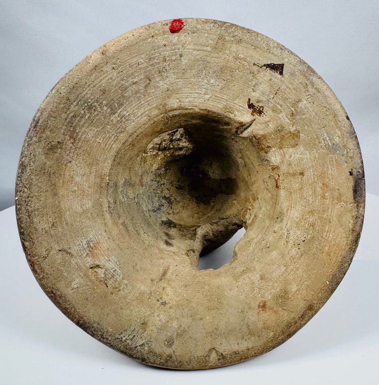 Ancient Manteño ceremonial pottery from coastal Ecuador featuring a sculpted human figure and ritual incense chamber.