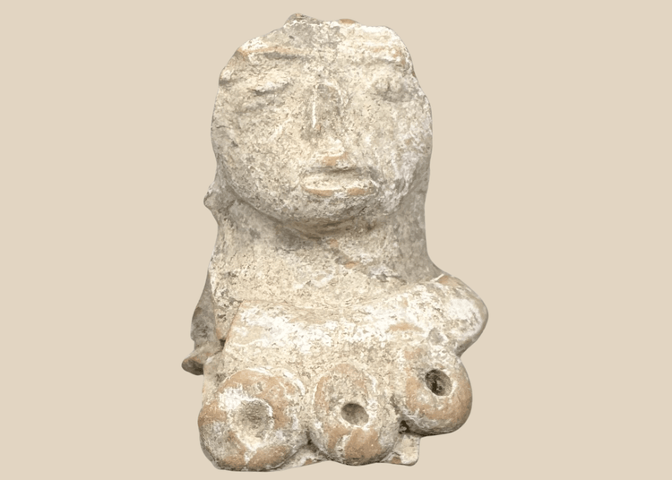 Pre-Columbian terracotta female figure fragment with prominent headdress and stylized facial features, Mesoamerica, circa 300 BCE–600 CE.