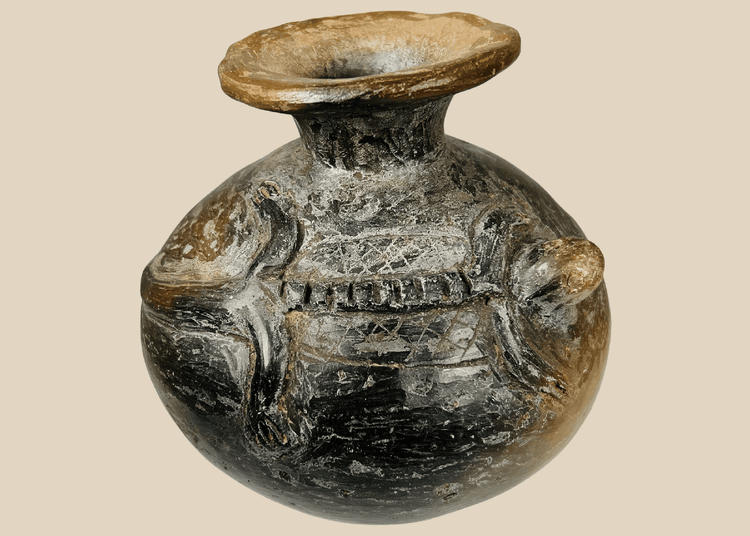 Pre-Columbian Nicoya terracotta vessel with reptilian relief figures