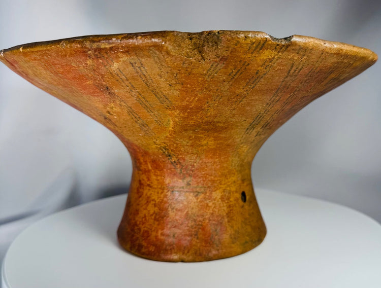 Pre-Columbian pottery vessel with wide dish form, painted decoration, and aged archaeological surface