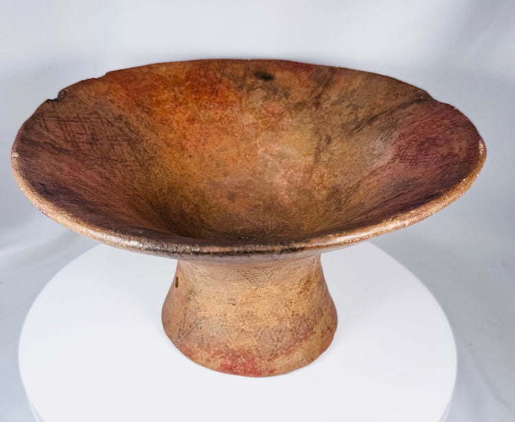 Archaeological pottery vessel from ancient Mesoamerica featuring a sculptural pedestal design