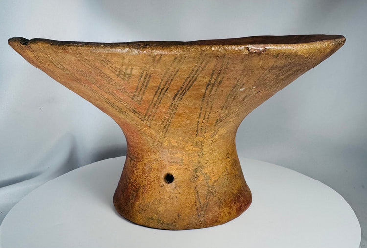 Pre-Columbian ceremonial pottery bowl raised on a pedestal base with mineral pigment motifs