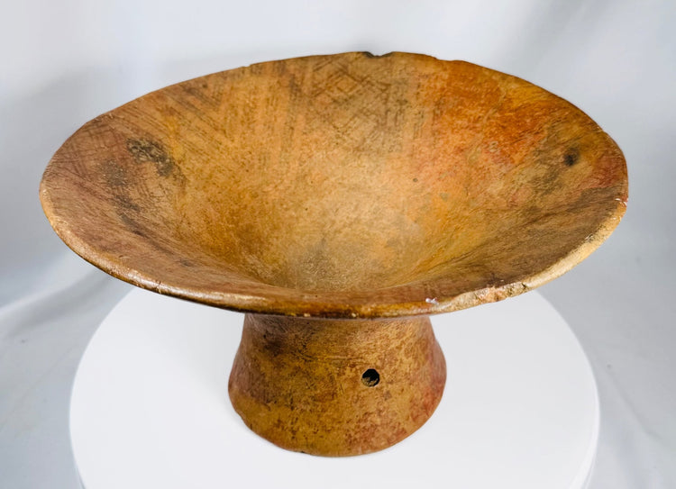 Hand-formed Pre-Columbian earthenware vessel featuring geometric designs and flared rim