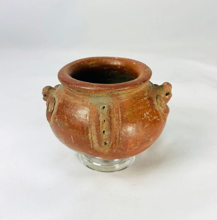 Pre-Columbian terracotta vessel with sculpted handles and decorative motifs, Central or South America, 1000–1500 CE