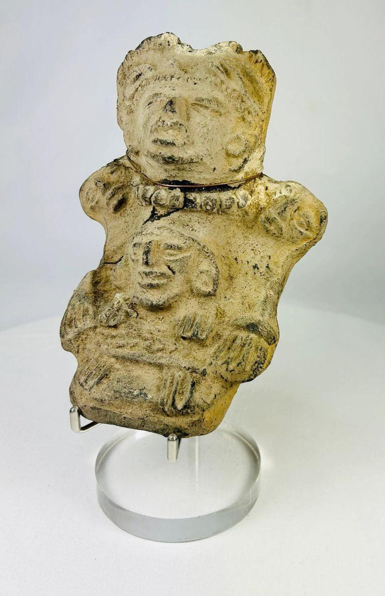Detail of incised headdress and necklace on a Pre-Columbian effigy
