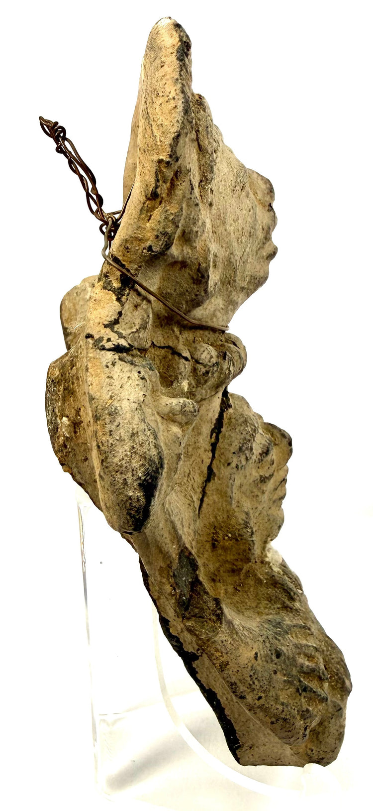 Weathered beige and grey dual-figure ceramic effigy displayed on clear acrylic stand
