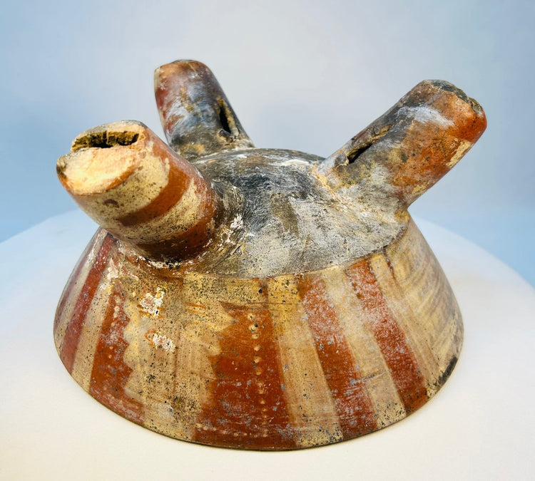 Authentic ancient tripod bowl with weathered painted decoration and patina